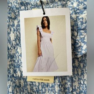 Nation LTD sz S flutter strap dress with elasticized bodice and bow tie in back.